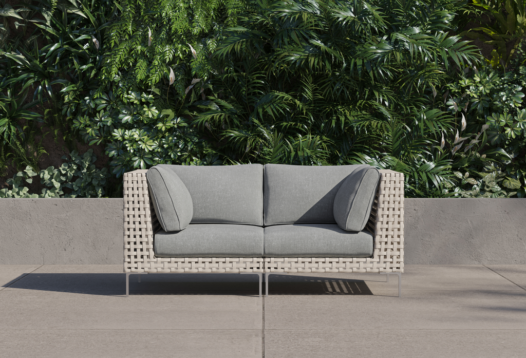 Canapé deux places d'extérieur en osier à tissage ajouré